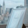 Peninsula NYC napkin transformed into a work of art