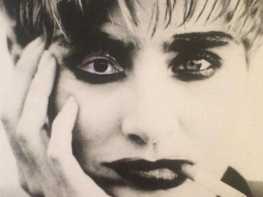 Intersecciones – Mixed media portrait by Rosana Auqué exploring emotion and perception through collage.