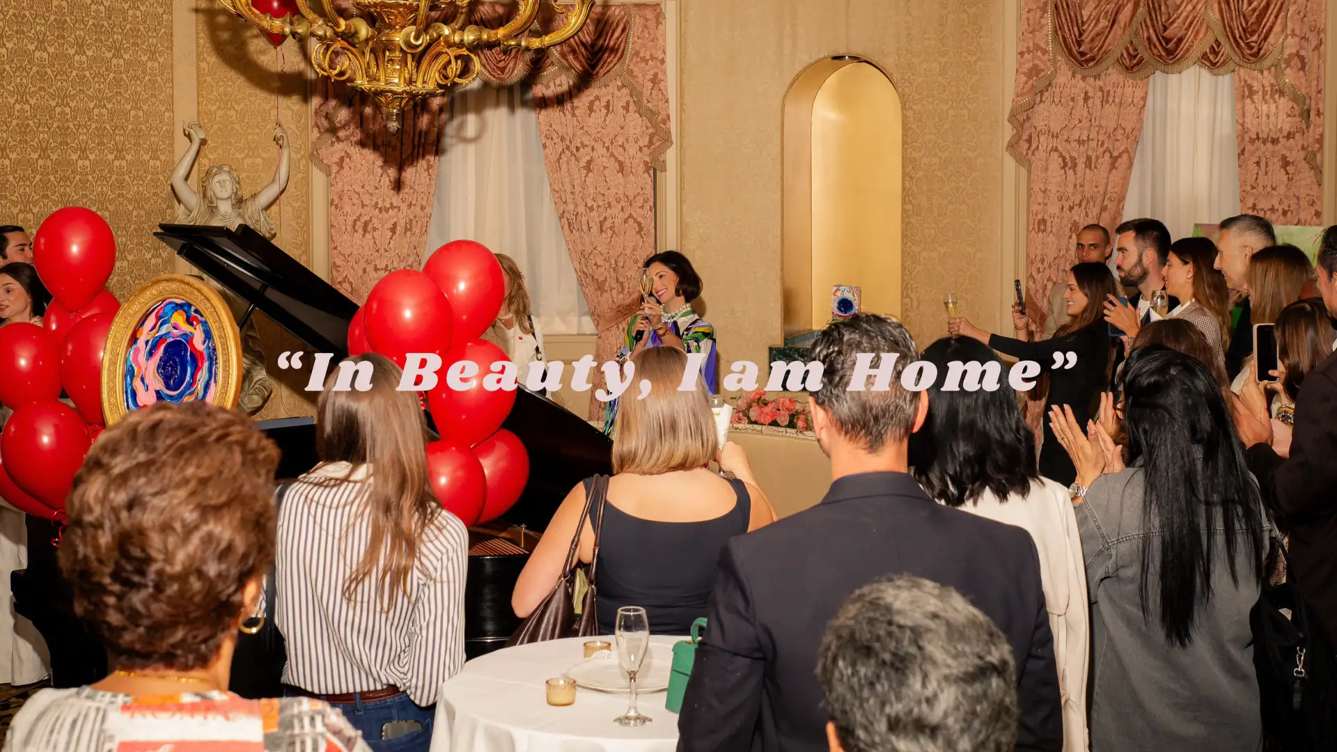 osana Auqué speaking at the opening of her exhibition “In Beauty, I am Home” at The Columbus Foundation in New York.