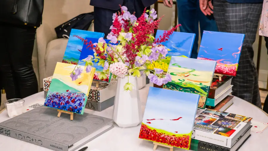 small-flower-and-sky-paintings-rosana-auque-waldorf-astoria-new-york-2026 Small flower and sky paintings by Rosana Auqué displayed at Waldorf Astoria New York